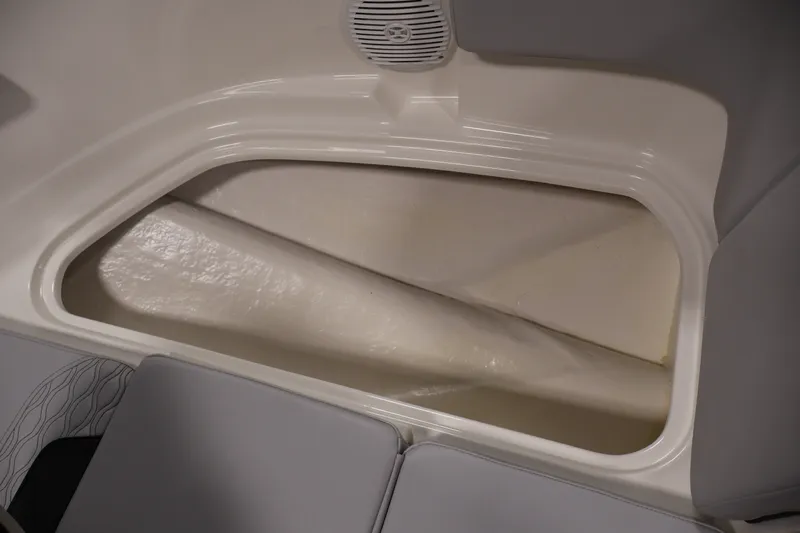 Slide: The Image of Storage compartment in 2026 Bayliner Element M17 boat interior. - 11