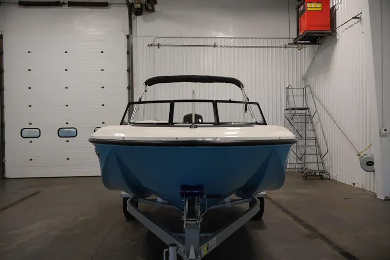 Slide: The Image of 2026 Bayliner Element M17 boat in indoor storage, front view. - 1
