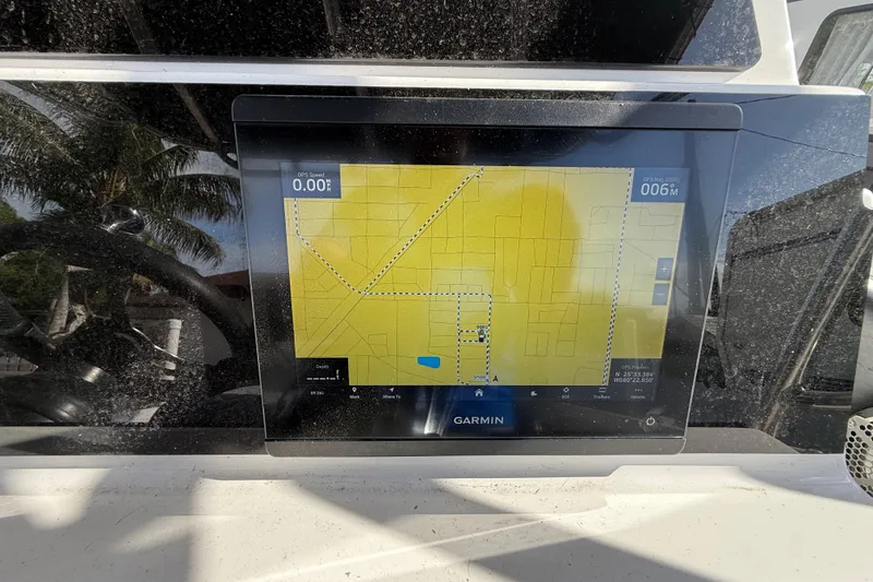 Slide: The Image of Garmin GPS display on 1989 Wellcraft 302 Scarab boat dashboard. - 100