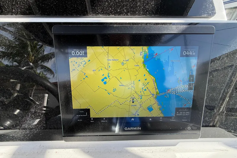 Slide: The Image of Garmin GPS display on 1989 Wellcraft 302 Scarab boat, showing navigation map. - 101