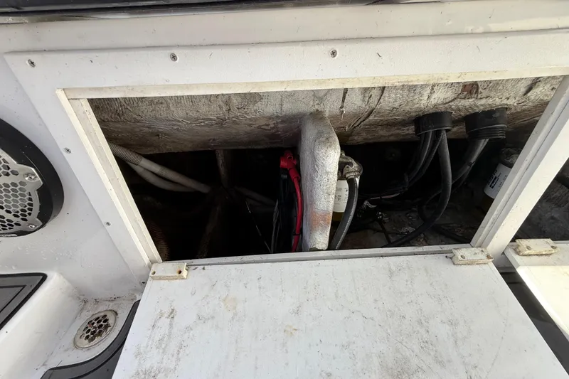 Slide: The Image of Open engine compartment of 1989 Wellcraft 302 Scarab boat, showing wiring and components. - 112