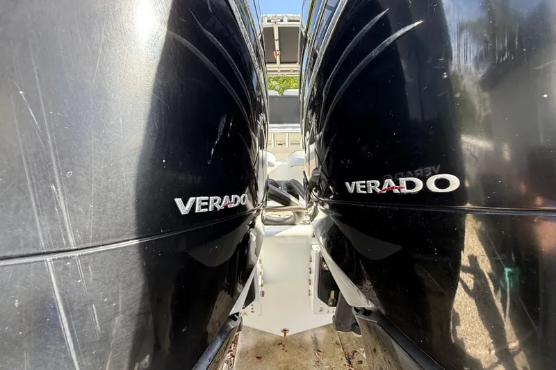 Slide: The Image of Twin Verado engines on a 1989 Wellcraft 302 Scarab boat. - 123