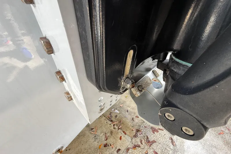 Slide: The Image of Close-up of 1989 Wellcraft 302 Scarab boat engine components and mounting bolts. - 125