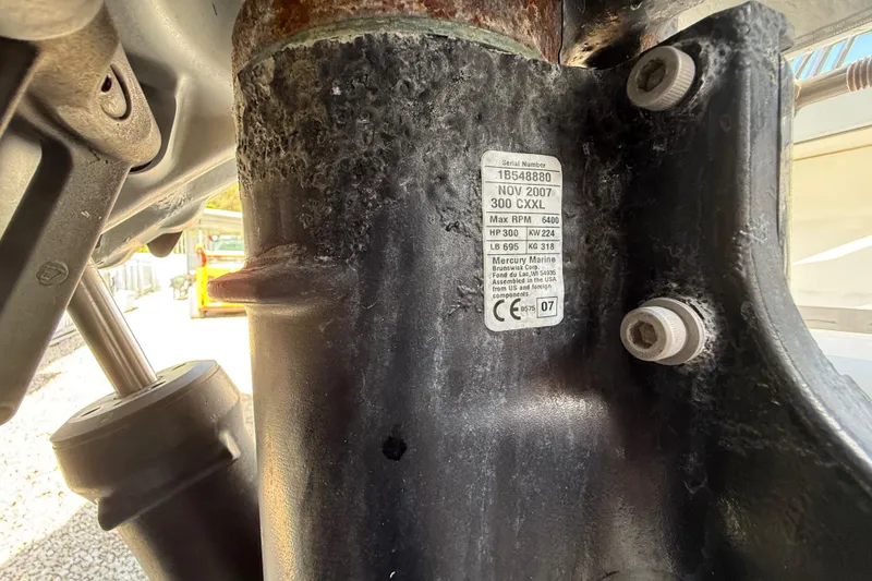 Slide: The Image of Close-up of a Wellcraft 302 Scarab 1989 engine part with serial number label. - 18