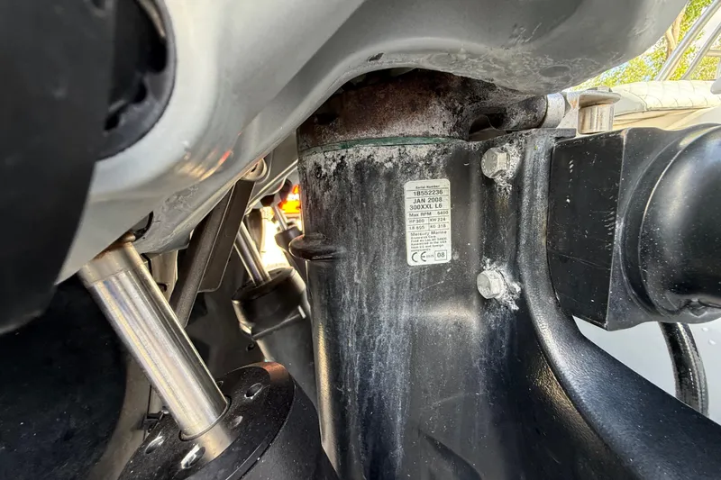 Slide: The Image of Close-up of mechanical components on a 1989 Wellcraft 302 Scarab boat. - 19