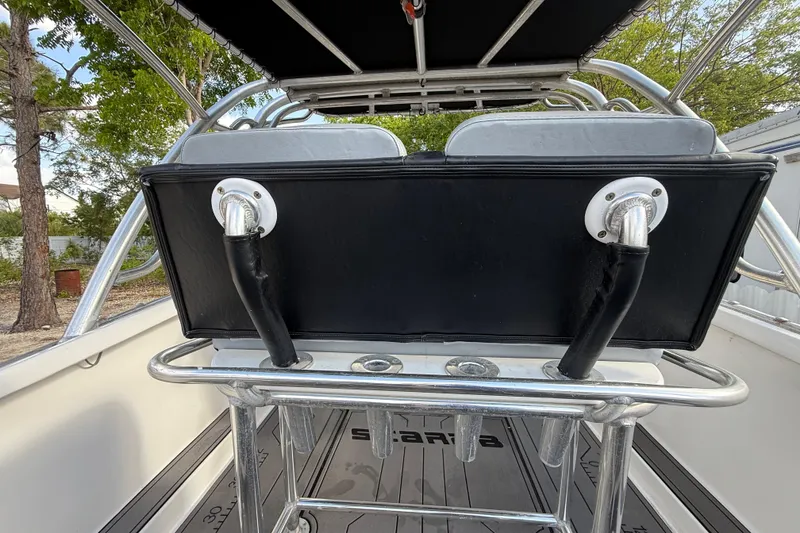 Slide: The Image of 1989 Wellcraft 302 Scarab boat interior with seating and metal framework. - 61