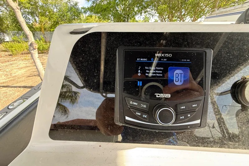 Slide: The Image of Boat dashboard with DS18 MRX150 stereo system on a 1989 Wellcraft 302 Scarab. - 97