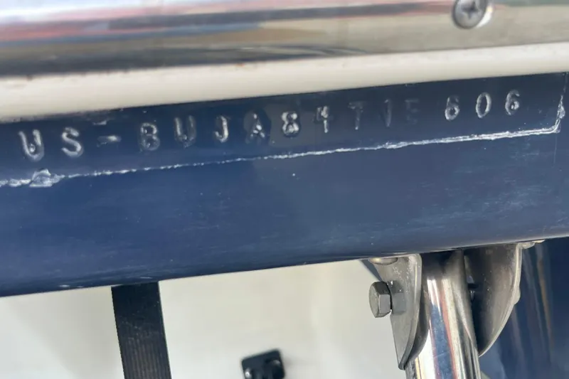 Slide: The Image of Hull identification number on a 2006 Tahoe 222 boat, showing "US-BUJ8471E606". - 29