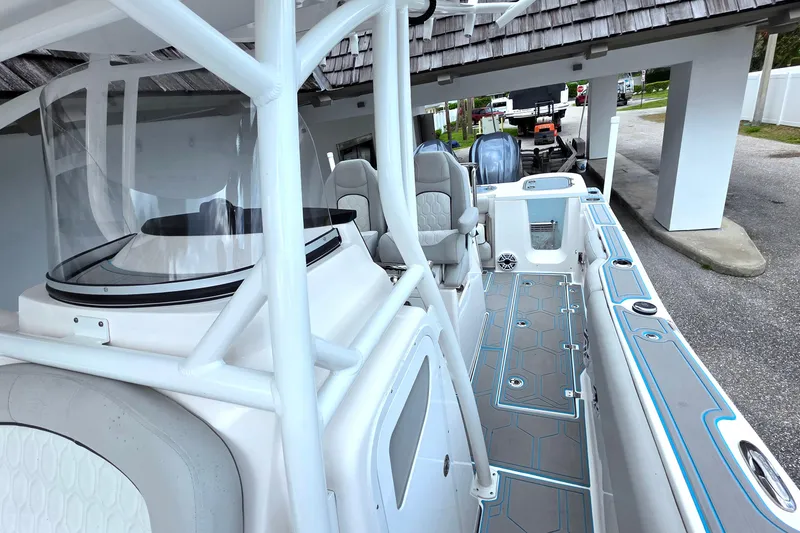 Slide: The Image of 2023 Sea Fox 288 Commander boat interior with modern seating and sleek design. - 15