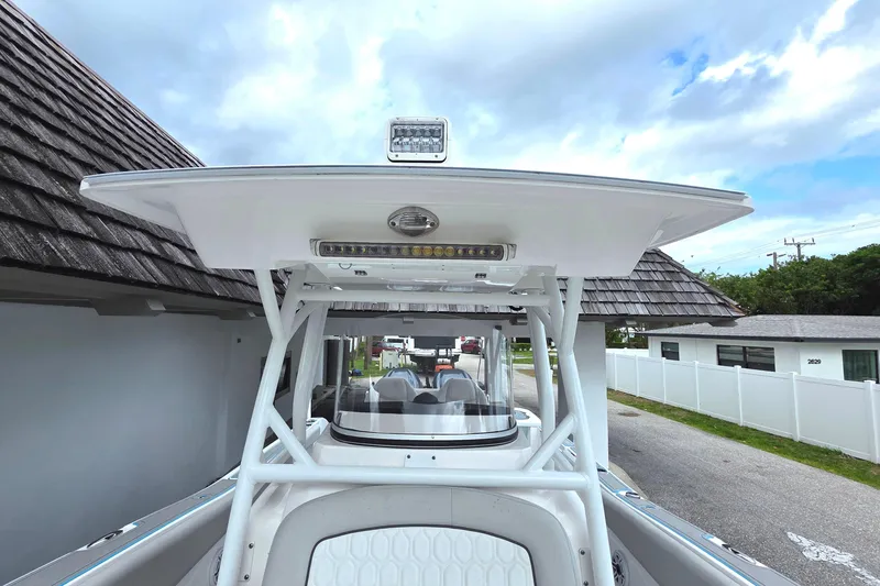 Slide: The Image of 2023 Sea Fox 288 Commander boat with T-top and modern design features. - 17