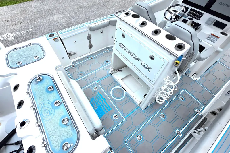 Slide: The Image of 2023 Sea Fox 288 Commander boat interior with modern seating and control panel. - 20