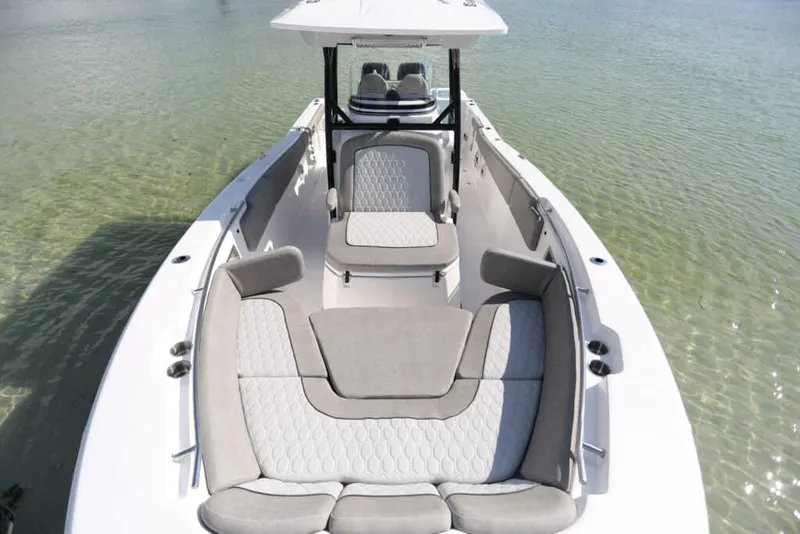 Slide: The Image of 2023 Sea Fox 288 Commander boat interior with cushioned seating and modern design. - 5