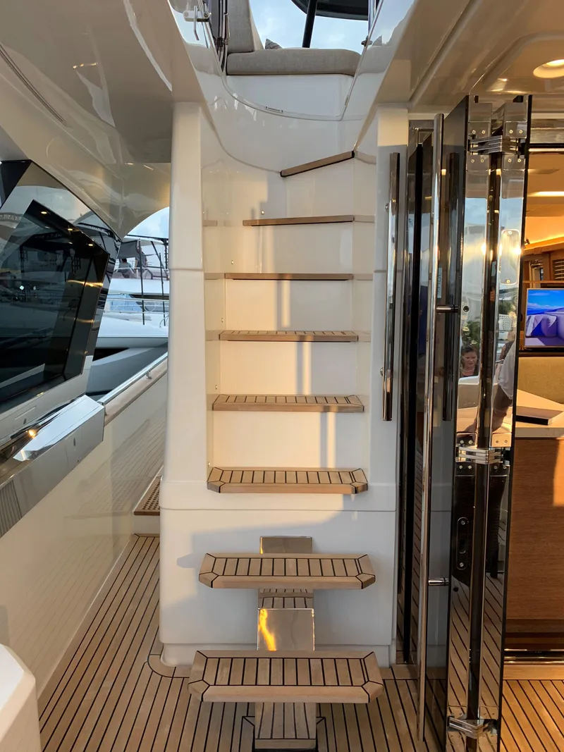 Slide: The Image of Staircase on a 2018 Monte Carlo Yachts MCY 65 luxury yacht. - 28