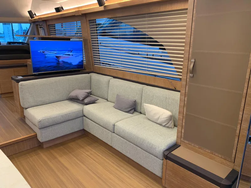 Slide: The Image of Luxurious interior of 2018 Monte Carlo Yachts MCY 65 with modern sofa and TV. - 43