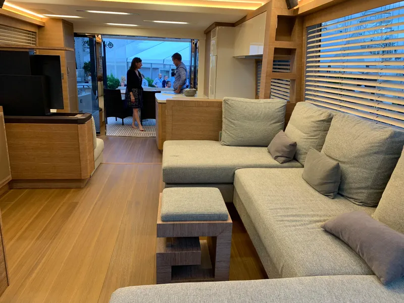 Slide: The Image of Luxurious interior of 2018 Monte Carlo Yachts MCY 65 with modern furnishings and spacious layout. - 46