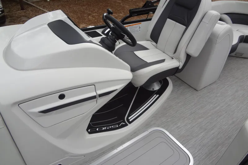 Slide: The Image of Captain's seat of 2021 Baraletta Corsa 23 QSS boat, featuring sleek design and modern controls. - 16
