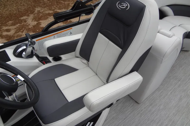 Slide: The Image of Captain's seat of 2021 Baraletta Corsa 23 QSS boat, featuring sleek design and comfortable upholstery. - 17