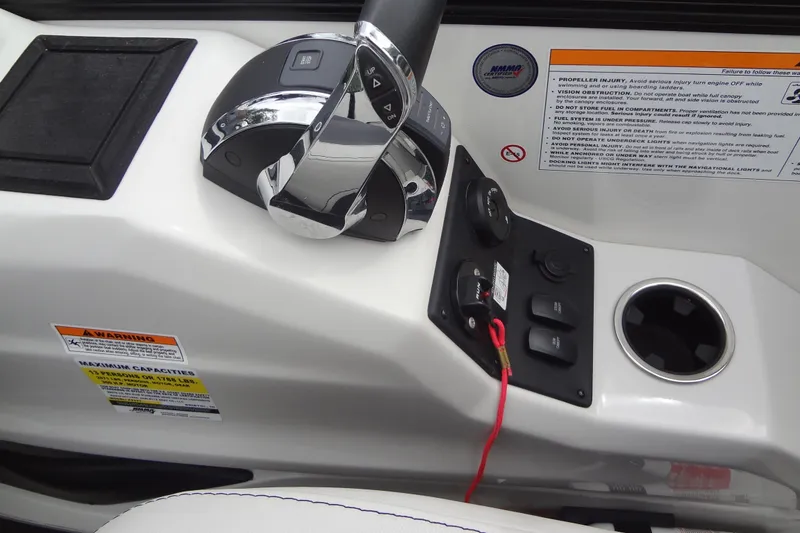 Slide: The Image of Control panel of a 2021 Baraletta Corsa 23 QSS boat with throttle and switches. - 20