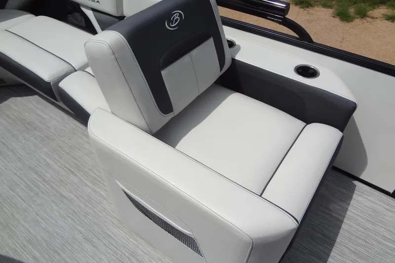 Slide: The Image of Luxurious seating on 2021 Baraletta Corsa 23 QSS boat, featuring sleek design and cup holders. - 23