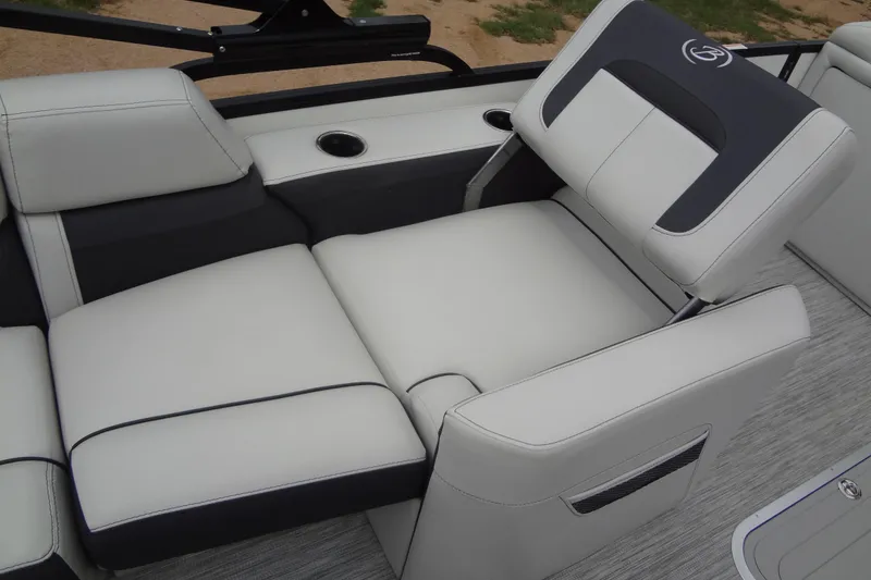 Slide: The Image of Luxurious seating on 2021 Baraletta Corsa 23 QSS boat, featuring sleek design and cup holders. - 24