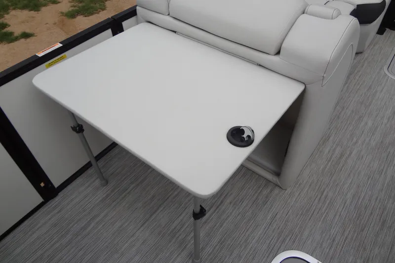 Slide: The Image of Baraletta Corsa 23 QSS 2021 boat interior with foldable table and seating. - 35