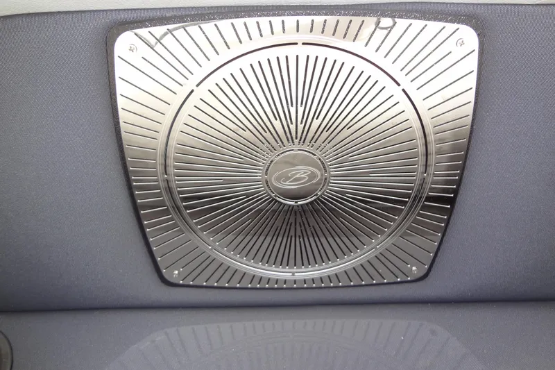 Slide: The Image of Chrome speaker grille in 2021 Baraletta Corsa 23 QSS boat interior. - 37