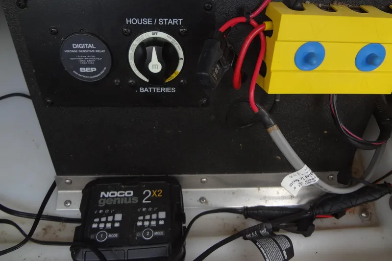 Slide: The Image of Electrical panel with battery switch and NOCO Genius charger in Baraletta Corsa 23 QSS, 2021 model. - 40