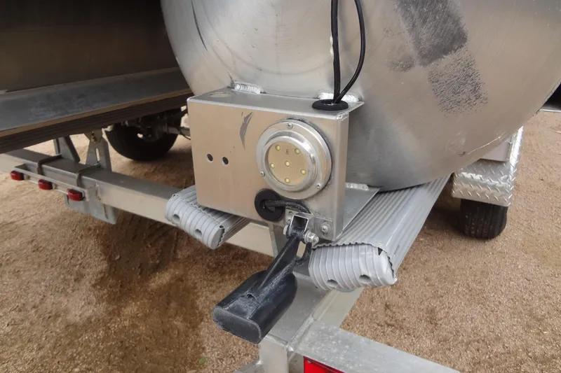 Slide: The Image of Trailer hitch and connector on a 2021 Baraletta Corsa 23 QSS boat trailer. - 46