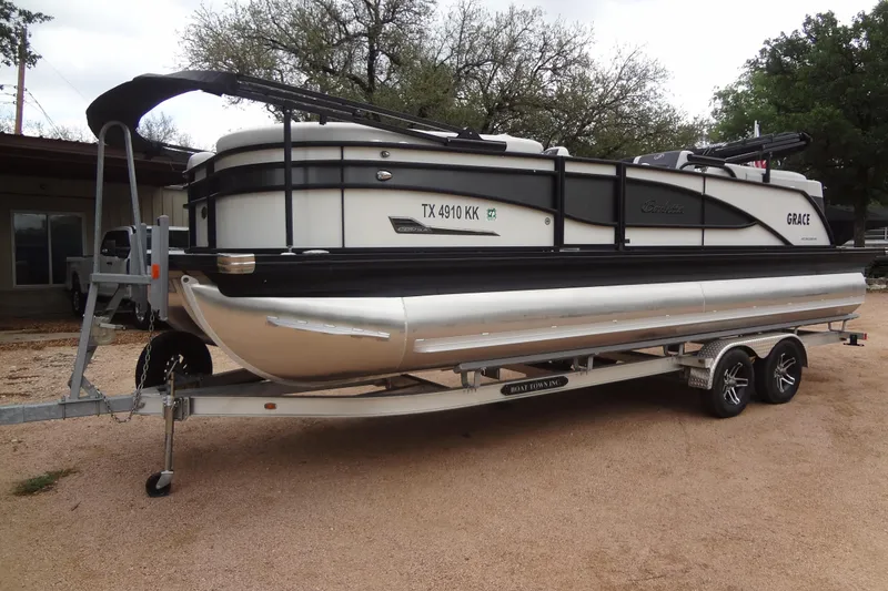 Slide: The Image of 2021 Baraletta Corsa 23 QSS pontoon boat on trailer, parked outdoors. - 6