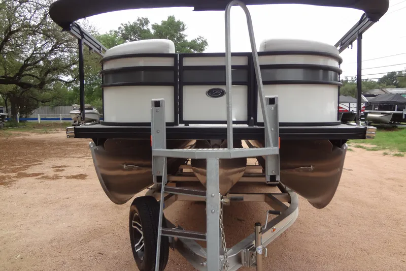 Slide: The Image of 2021 Baraletta Corsa 23 QSS pontoon boat on trailer, parked outdoors. - 7