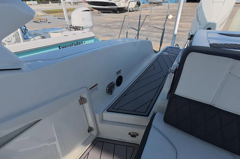 Slide: The Image of 2023 Monterey 305SS Super Sport boat interior with sleek seating and modern design. - 16