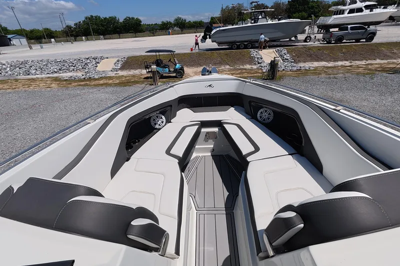 Slide: The Image of 2023 Monterey 305SS Super Sport boat interior with luxurious seating and modern design. - 3