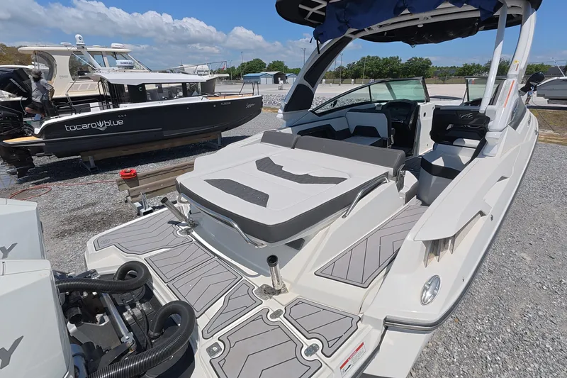 Slide: The Image of 2023 Monterey 305SS Super Sport boat with sleek design and spacious seating. - 5