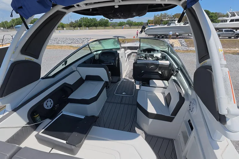 Slide: The Image of 2023 Monterey 305SS Super Sport boat interior with sleek seating and modern dashboard. - 7