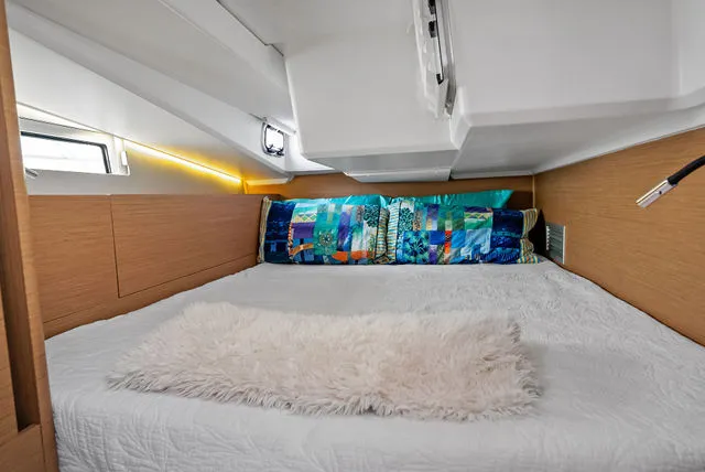 Slide: The Image of Manufacturer Provided Image: 2026 Jeanneau NC 1095 Coupe Series 2 boat with spacious deck and seating area. - 2