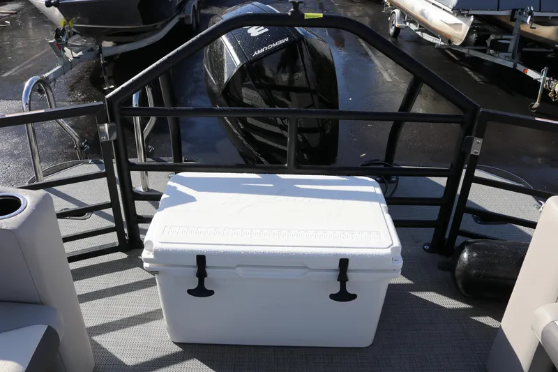 Slide: The Image of 2024 SunChaser Eclipse LR DH 25 Demo boat with cooler and Mercury engine. - 13