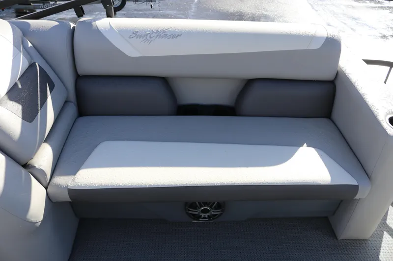 Slide: The Image of 2024 SunChaser Eclipse LR DH 25 Demo boat seat, gray upholstery, outdoor setting. - 14