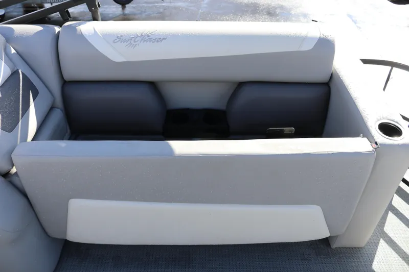 Slide: The Image of 2024 SunChaser Eclipse LR DH 25 Demo boat seat with cup holder and storage. - 15