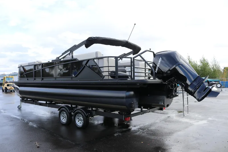 Slide: The Image of 2024 SunChaser Eclipse LR DH 25 Demo pontoon boat on trailer, featuring Mercury outboard motor. - 3