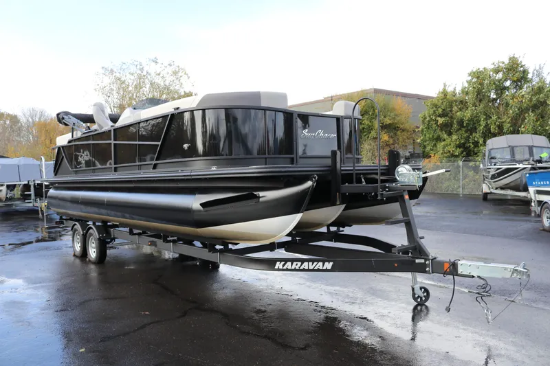 Slide: The Image of 2024 SunChaser Eclipse LR DH 25 Demo pontoon boat on Karavan trailer. - 5