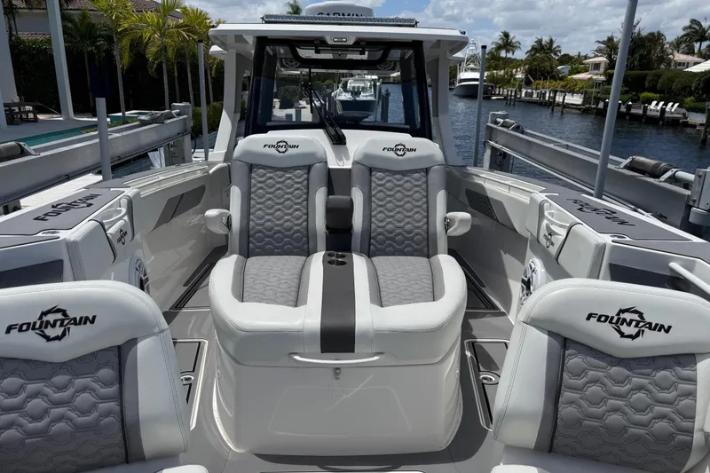 Slide: The Image of 2023 Fountain 38 SCX boat interior with luxurious seating and modern design. - 17