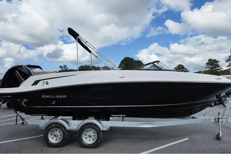 Slide: The Image of 2026 Bayliner VR6 Bowrider OB on trailer under cloudy sky. - 4