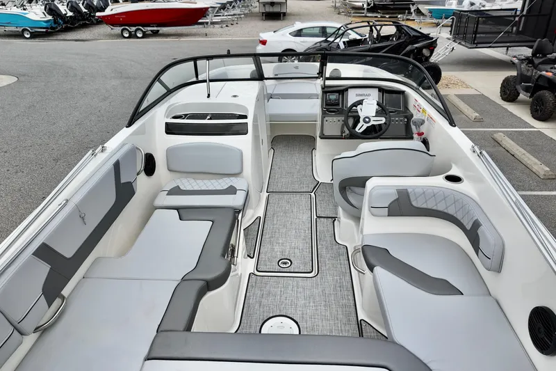 Slide: The Image of 2026 Bayliner VR6 Bowrider OB interior with spacious seating and modern dashboard. - 7