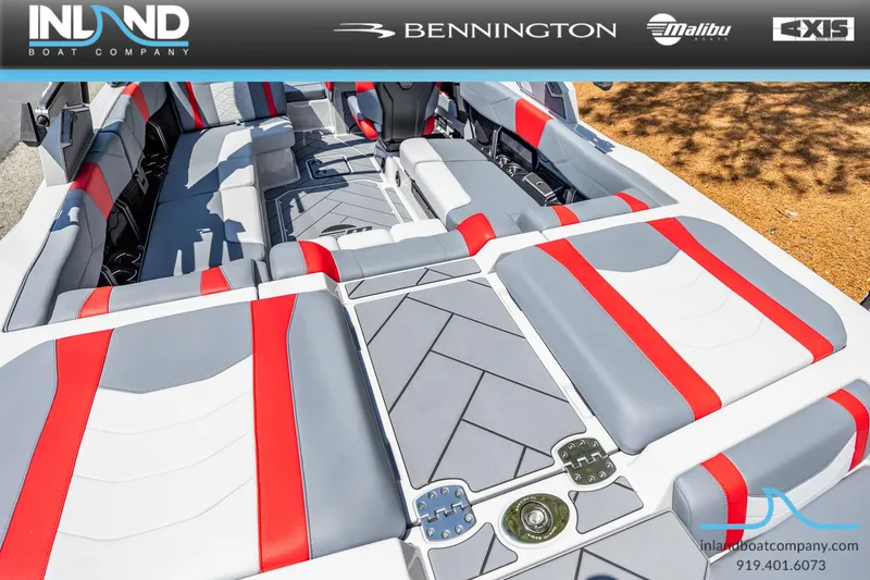 Slide: The Image of Interior of 2026 Malibu Wakesetter 23 LSV with gray and red seating. - 16