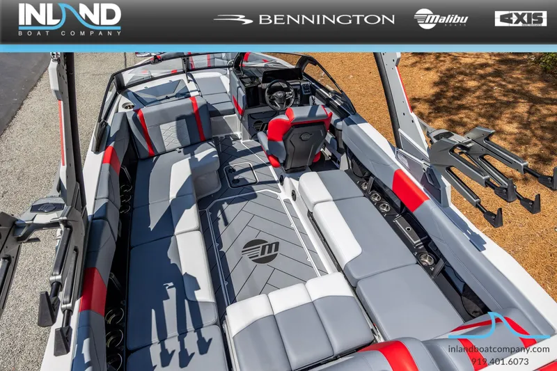 Slide: The Image of Interior of 2026 Malibu Wakesetter 23 LSV with gray and red seating. - 17