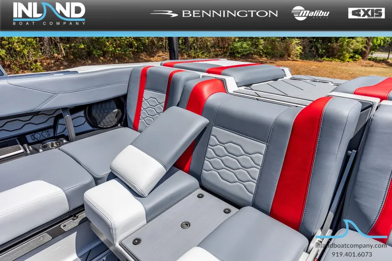Slide: The Image of Interior of 2026 Malibu Wakesetter 23 LSV with gray and red seating. - 19