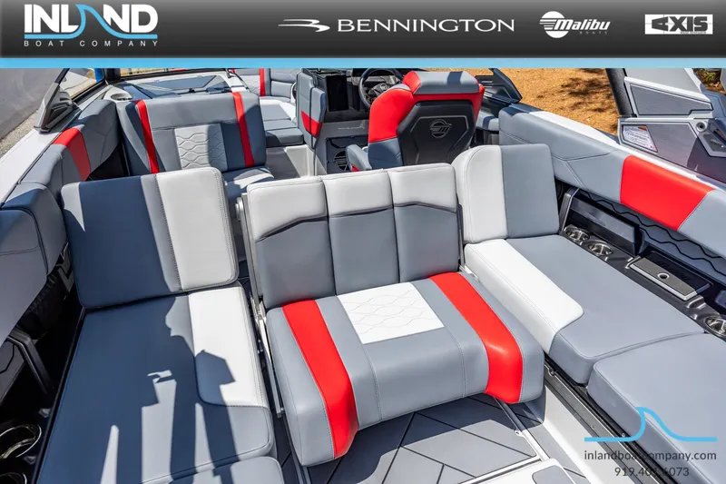 Slide: The Image of Interior of 2026 Malibu Wakesetter 23 LSV with gray and red seating. - 21