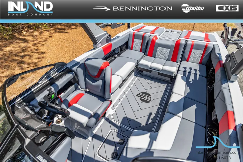 Slide: The Image of Interior of 2026 Malibu Wakesetter 23 LSV with gray and red seating. - 32