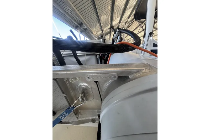 Slide: The Image of Close-up of 2006 Grand Banks 47 Heritage EU boat equipment under a metal roof. - 22