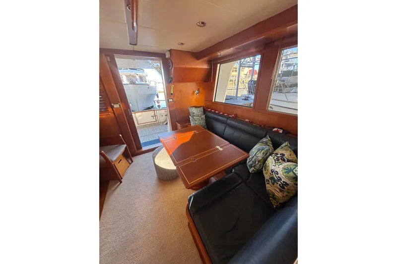 Slide: The Image of Luxurious interior of 2006 Grand Banks 47 Heritage EU yacht with plush seating and elegant decor. - 25